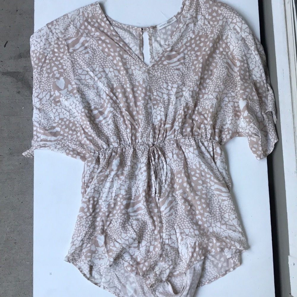 Honey punch animal print romper in tan
